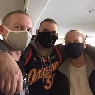 The three of us ready to eat, in the parking garage to the place!