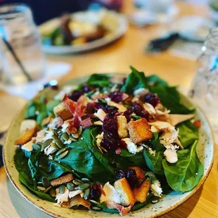 a plate of salad on a table