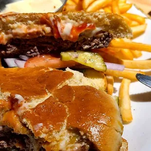 The well-done hamburger . Ordered medium rare.