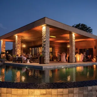 a pool and outdoor dining area