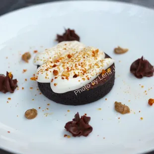 Chocolate Tart ($14) - Sunflower praline paste, chocolate cremeux, malt whip, honeycomb candy. It&apos;s OK