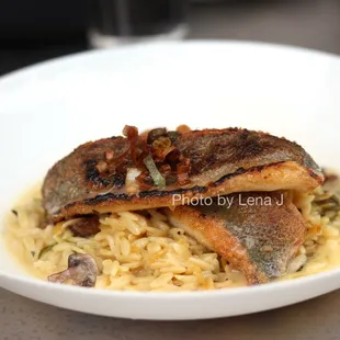 Branzino ($30) - Mushroom snow pea orzo pasta, miso cream, fried leeks, buerre blanc