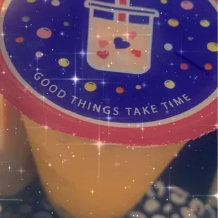 Thai Milk Tea (taste authentic) with extra boba CAN WE TALK ABOUT HOW CUTE THE LID SEAL IS