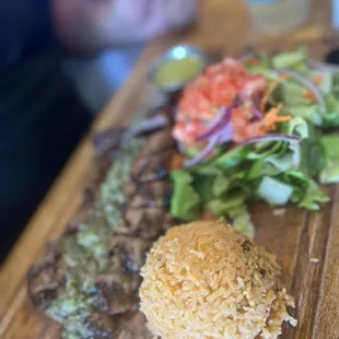 steak, rice, and salad