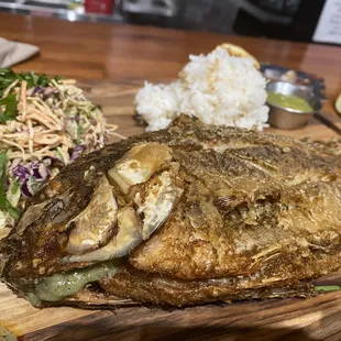 Fried fish marinated in lime vinaigrette