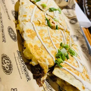 The Friday special for this week. A brisket Mac and cheese quesadilla. Out of this world! (Not on the regular menu)