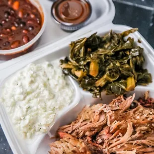 Pulled pork, collard greens, baked beans, slaw