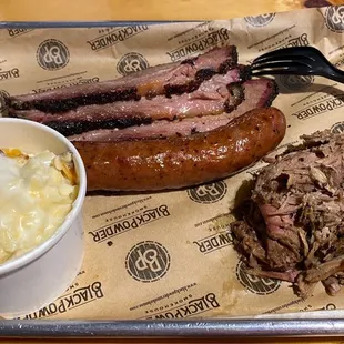 Texas Style Brisket, sausage, pulled pork, and Smoked Gouda Mac N Cheese