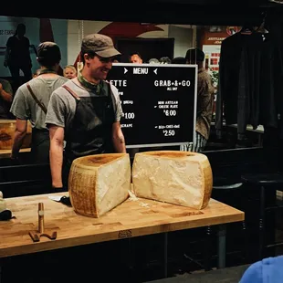 Large cheese wheel cracked open. What a cool process.