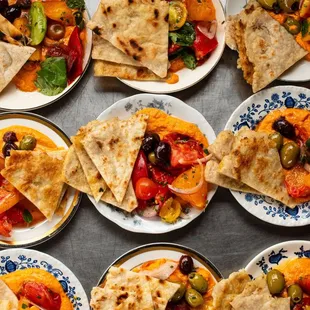 pimiento hummus, farm tomatoes, herbs, jalapeno, olive, &amp; gf bread dipper