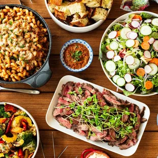 farmer salad, grilled flank steak with romesco, roasted veggies, focaccia with gorg mess, &amp; cavatappi pepperonata