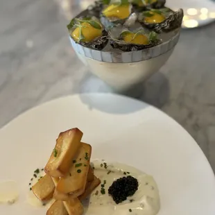 French fries with crème fraîche and caviar and kumamoto oysters with passion fruit and serrano foam. INSANE!