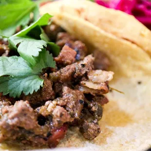 a close up of a taco
