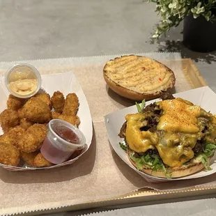 Spicy cheese curds and Philly cheese burger