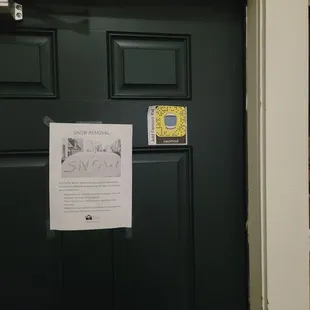 Apartments tagged by teen from Waterbrook with stickers of his Snapchat handle. Individual entered Black Sand buildings to place stickers.