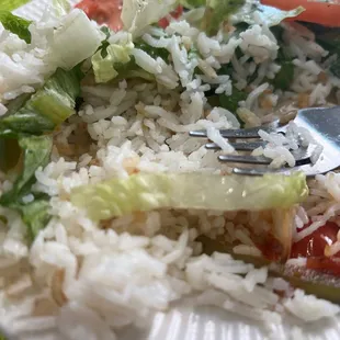 a plate of rice and vegetables