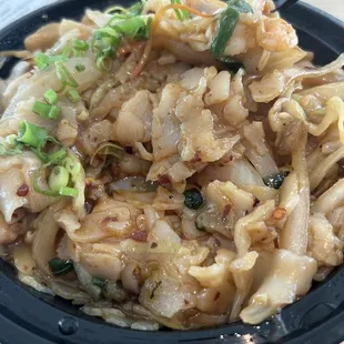 Overcooked stir fry noodles, hence the soggy, mushy, choppy texture $14