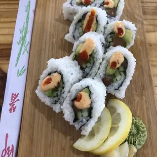 Spicy Salmon Roll, $8. Served in a wood slab, good presentation :).