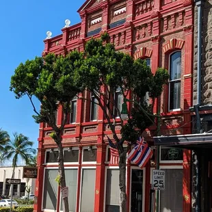 a red brick building with a clock tower