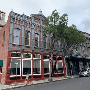a red brick building on a city street