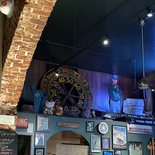 a bar with a large clock on the wall