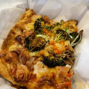 Chicken and broccoli pizza at Maggie's Farm Rum for happy hour.