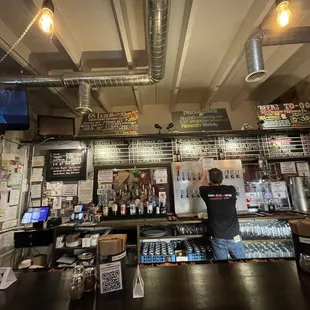 a bartender at the bar