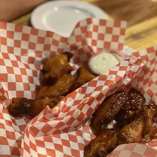 a basket of chicken wings