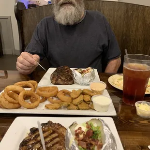 New York a tad over done, loaded baked potato and onion rings and fried pickles