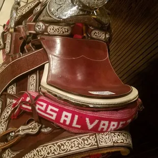 a saddle with a red and white stripe