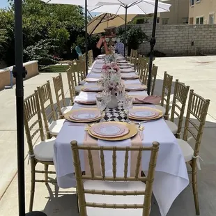 Beautiful gold chairs and Umbrella provided by Black Swan! Decor and setting by Lovingevents.co
