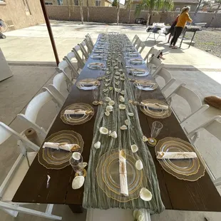 Two rustic farmhouse tables and chairs.