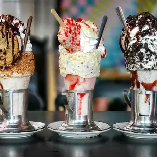 Vanilla cookie, strawberry shortcake, oreo cookie, with cookie sandwiches and an ice cream bar sitting on whip cream. Best on the planet.