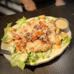 Caesar Salad. They go heavy on the cheese!