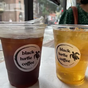 two cups of black turtle coffee