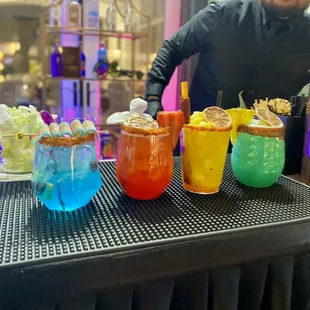 Our Signature Cocktails 
(Left to Right)
- La Toxica
- La Tusa
- Spiked Mango
- Mazatleca
