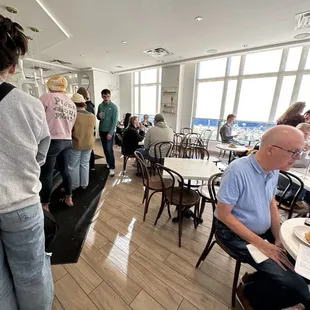 people eating and drinking