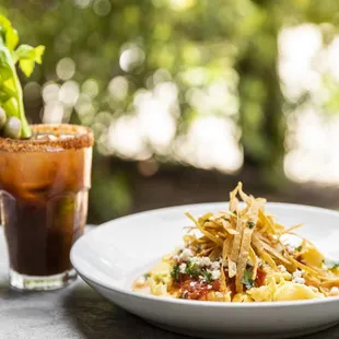 a plate of pasta and a drink