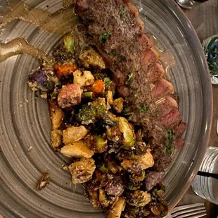 Cast Iron Strip, Peruvian potatoes and crispy sprouts