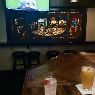 Medieval tavern themed stained glass.