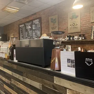 a counter with a coffee machine