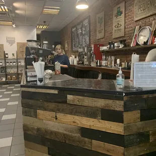 a woman behind the counter