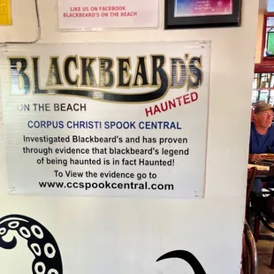 a sign in a restaurant