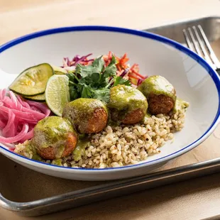 a bowl of food on a tray