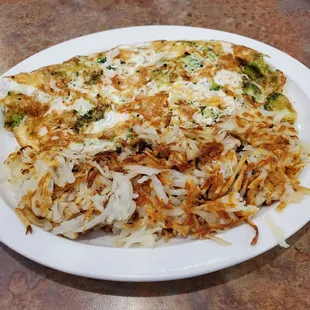 Egg white omelette with turkey, broccoli and cheese! With a side of hash browns. Huge portion size!