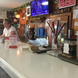 Brenda, the tavern owner