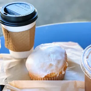 a cup of iced coffee and a doughnut