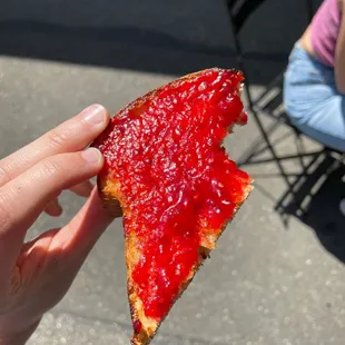 Raspberry jam on toast