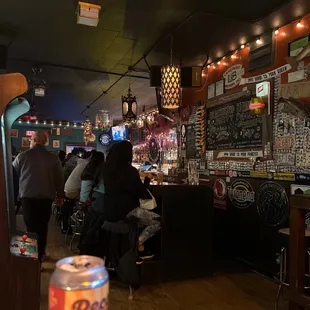 people sitting at the bar