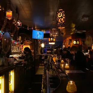 people sitting at the bar